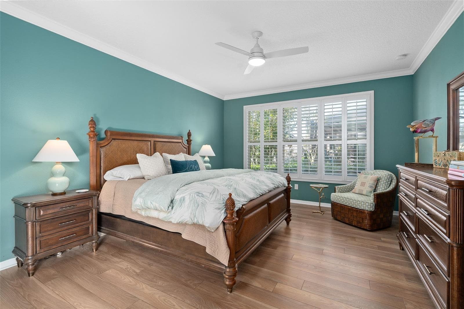 Primary Bedroom suite with Luxury Vinyl Plank Flooring Crown Molding and Plantation Shutters - 1038 TIMBERVALE TRL, CLERMONT