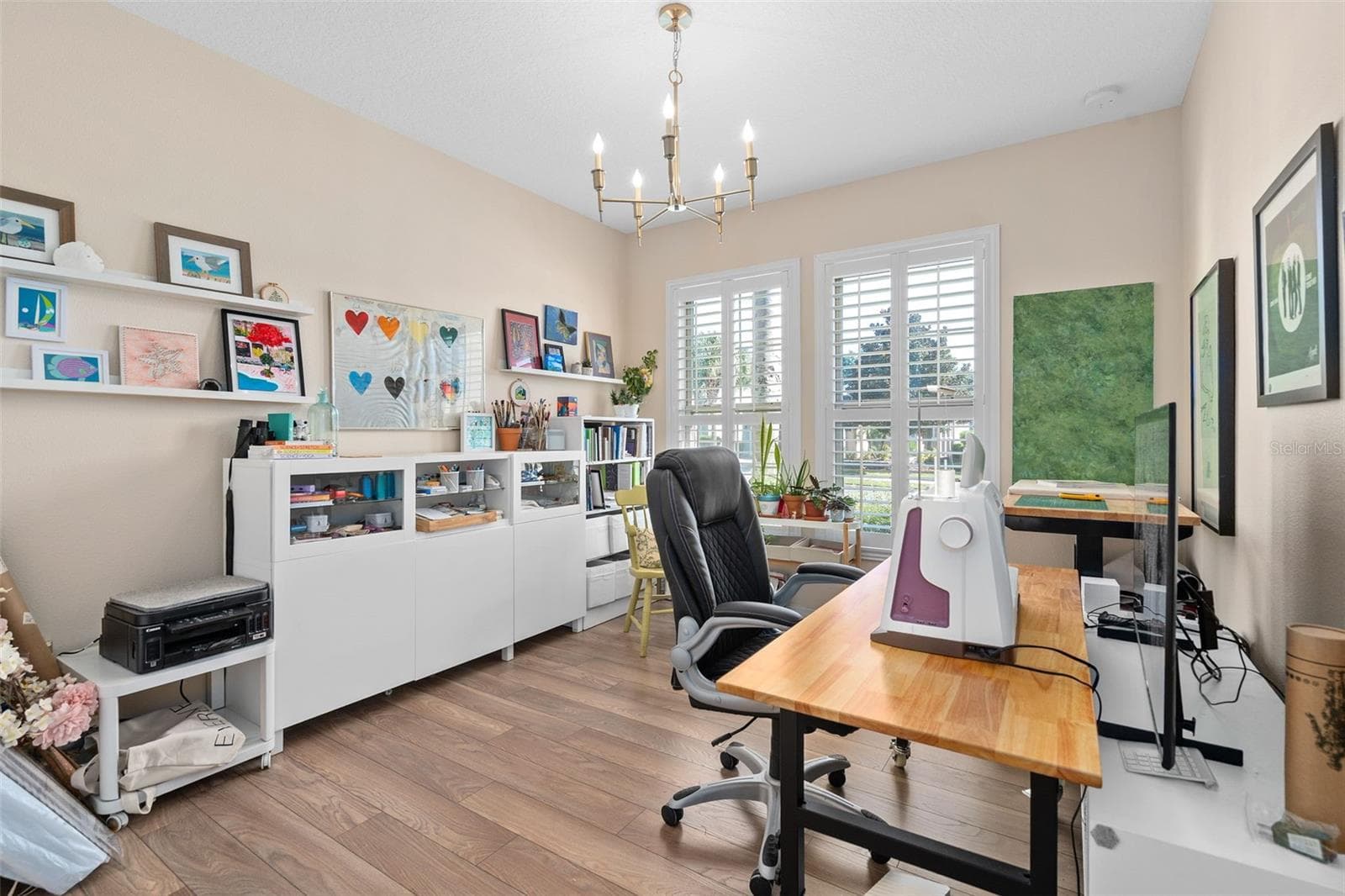 Bedroom 3 is utilized as a craft Room and offers LVP flooring - 1038 TIMBERVALE TRL, CLERMONT
