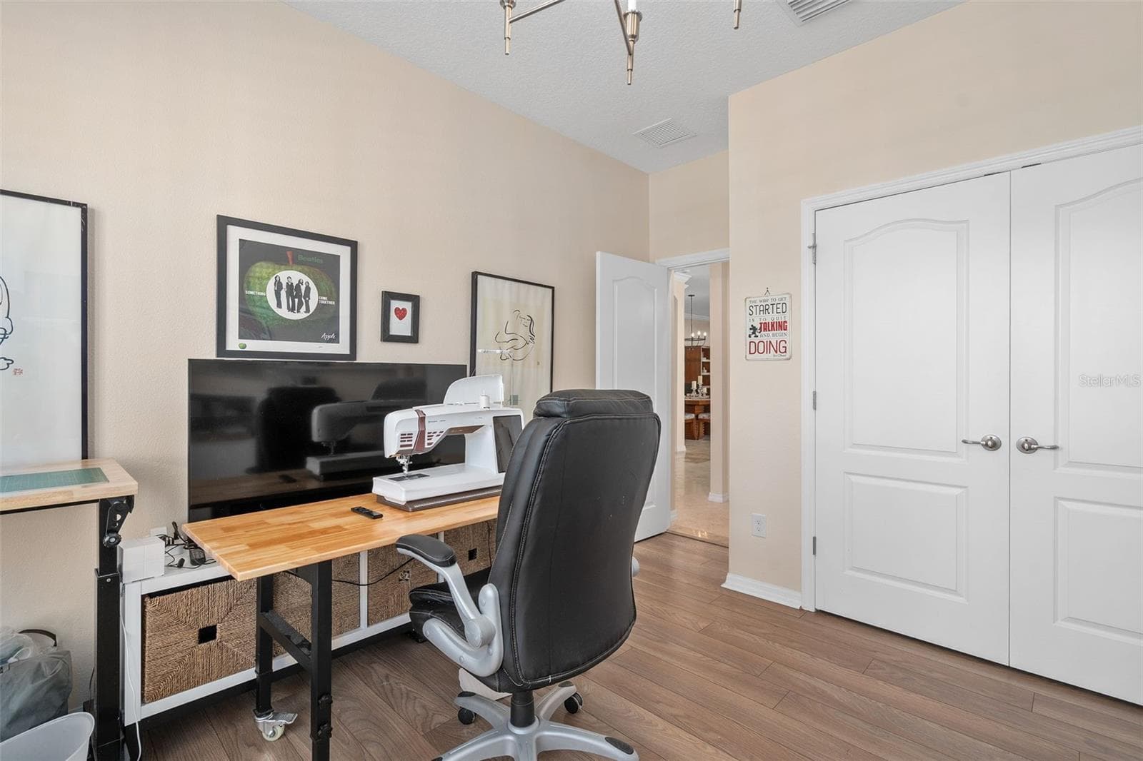 Bedroom 3 is utilized as a craft Room with LVP flooring - 1038 TIMBERVALE TRL, CLERMONT