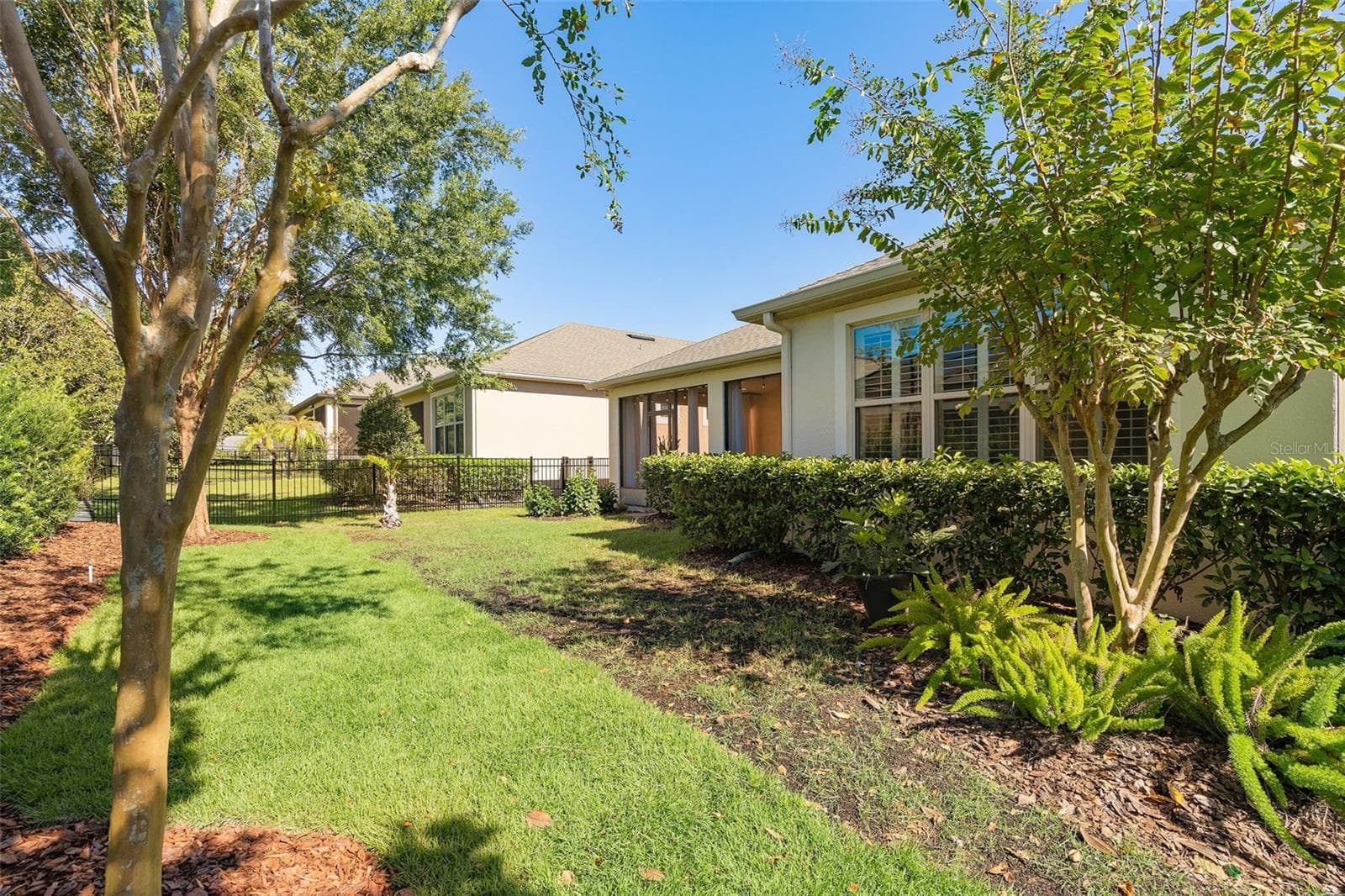 Rear Fully Fenced Yard (the backyard has been seeded) - 1038 TIMBERVALE TRL, CLERMONT