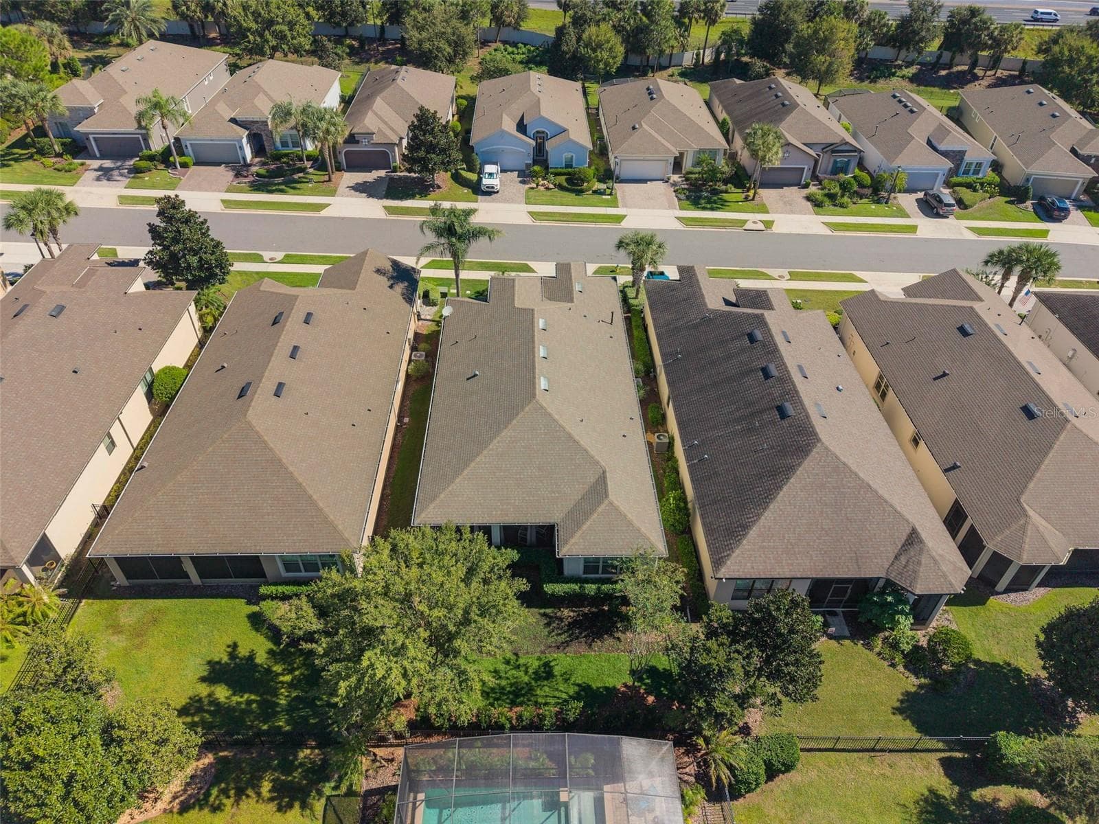 Drone view of the rear of the home - 1038 TIMBERVALE TRL, CLERMONT