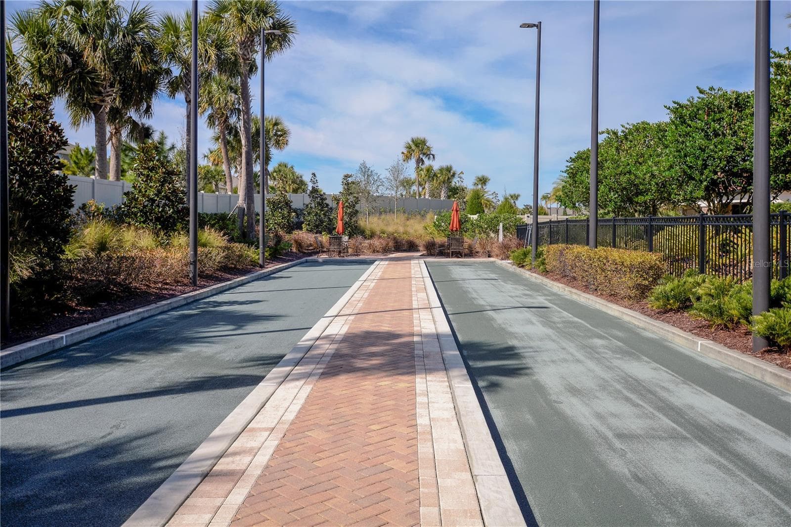 Clay Bocce' Courts. The Courts are lighted for nighttime play. - 1038 TIMBERVALE TRL, CLERMONT