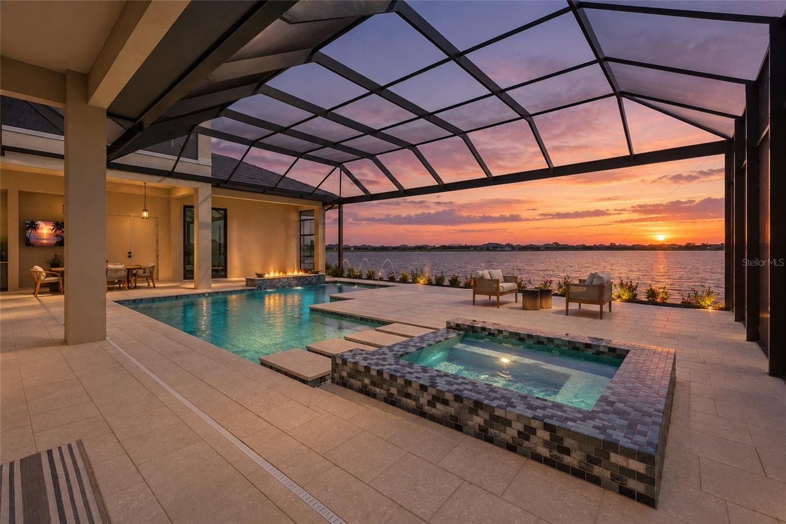 Start your mornings with stunning sunrise views on the lake - 596 BLUE SHELL LOOP, SARASOTA