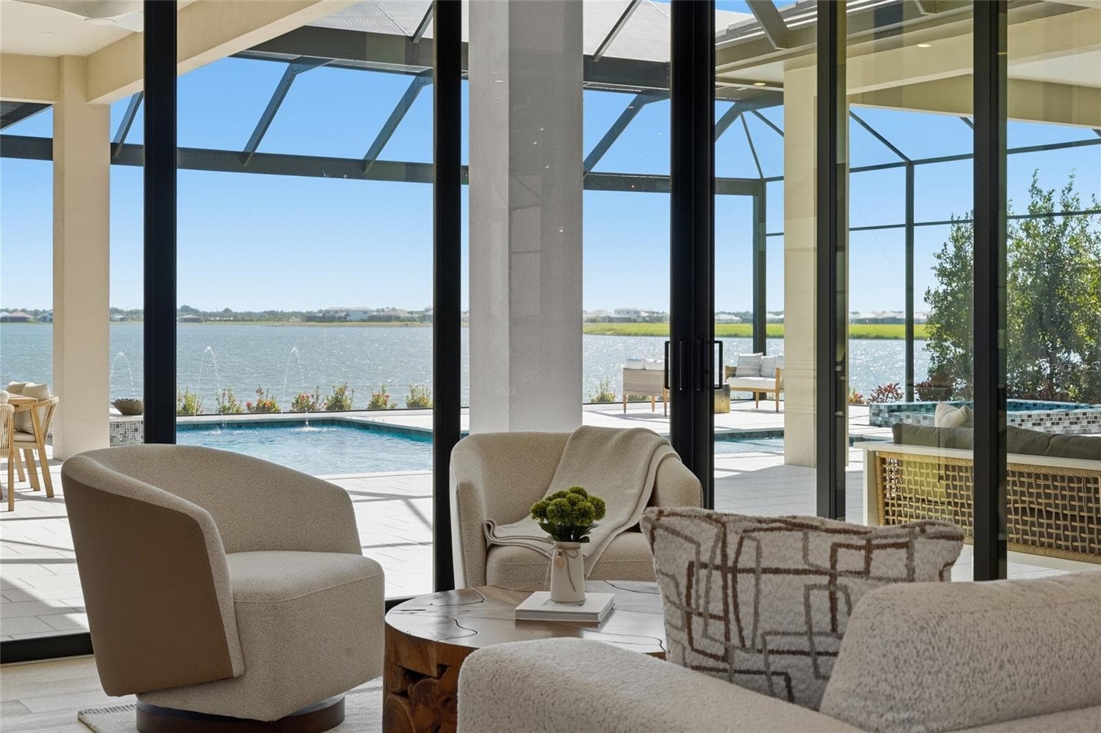 Views of the lake from every angle of the main living areas - 596 BLUE SHELL LOOP, SARASOTA