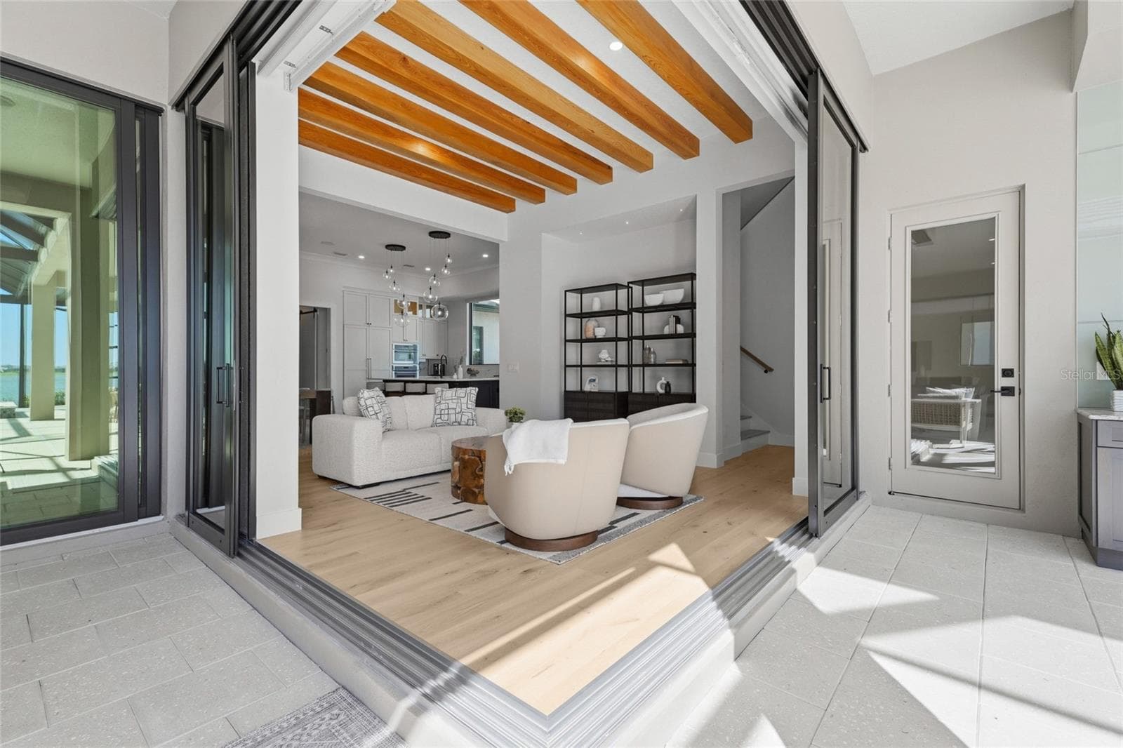 Seamless indoor/outdoor living with frameless corner pocket sliders - 596 BLUE SHELL LOOP, SARASOTA