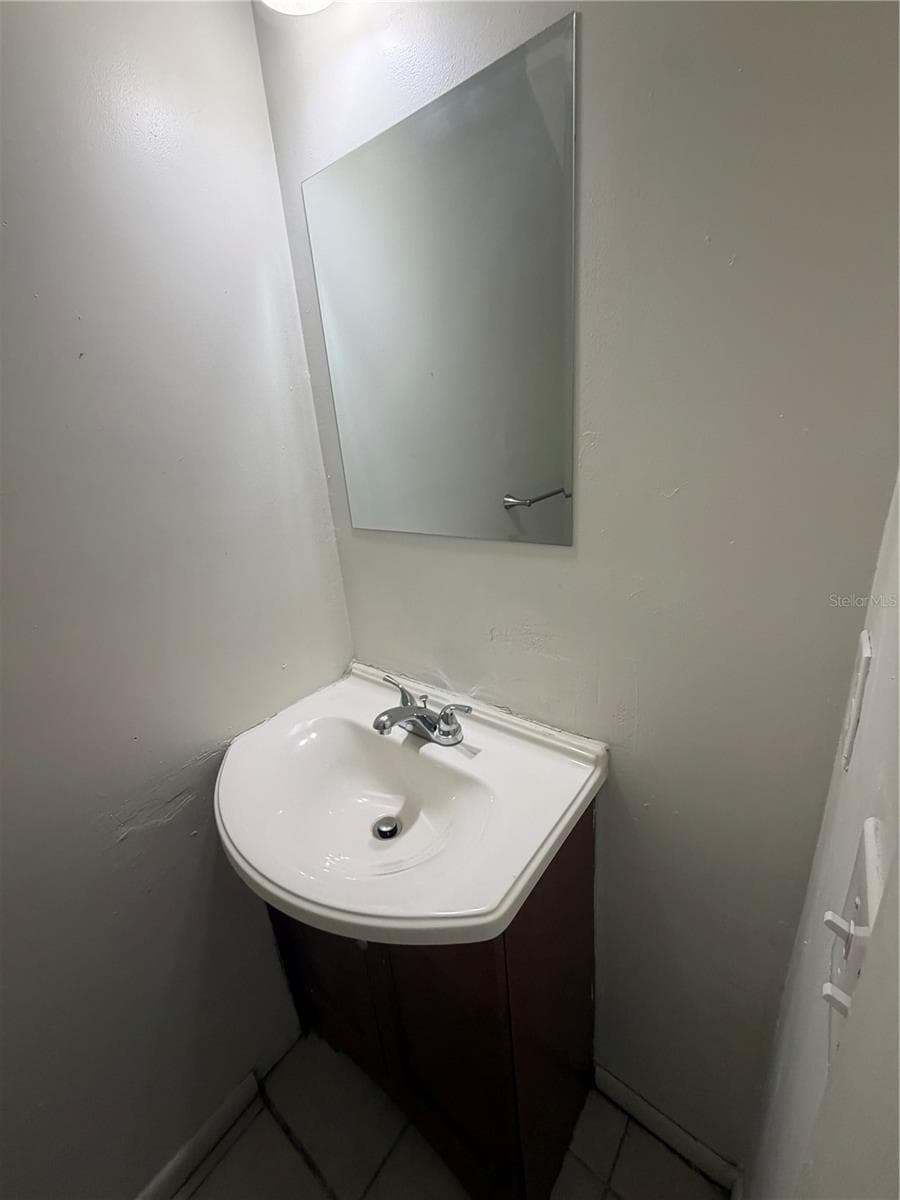 Downstairs half-bath. - 7034 SW 17TH PL, GAINESVILLE