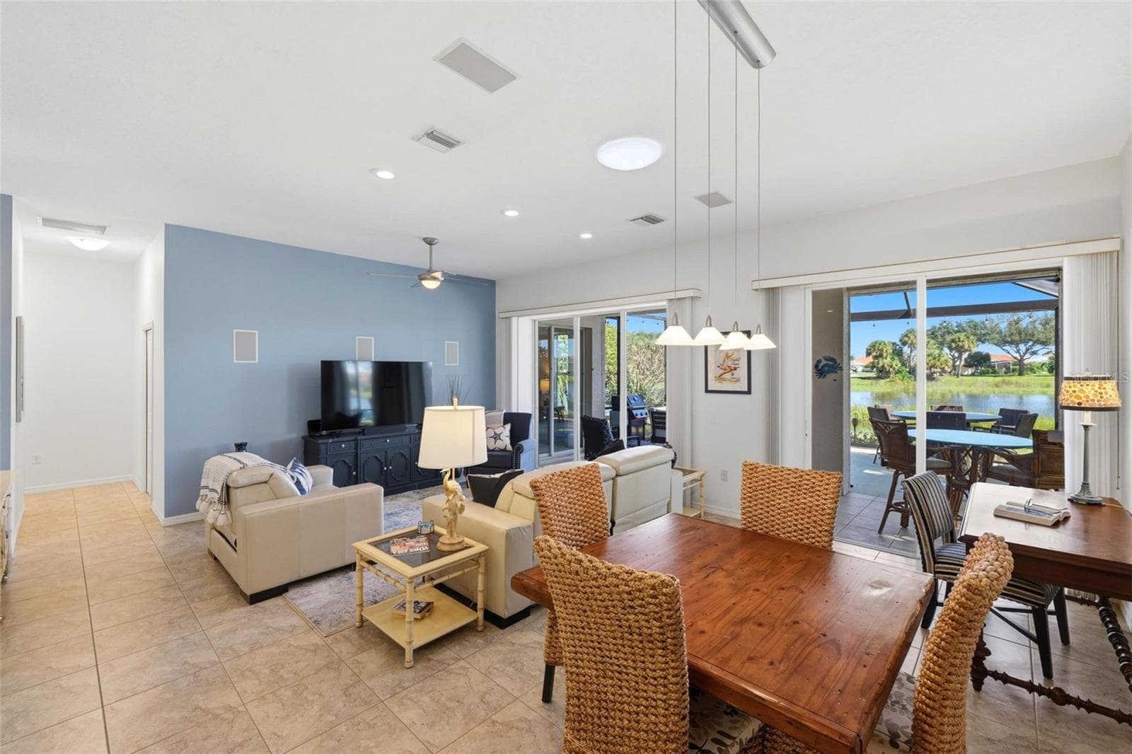 Living area with hallway to bedrooms - 687 LAKESCENE DR, VENICE