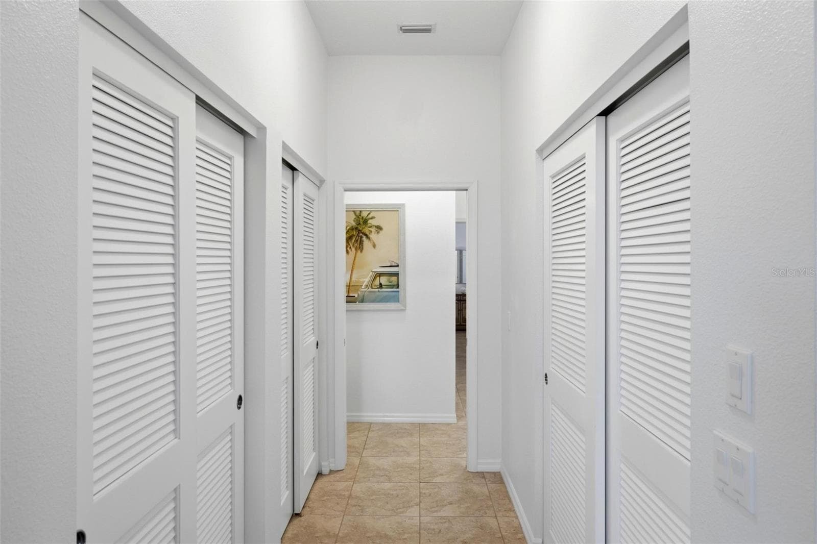 Primary bedroom closets - 687 LAKESCENE DR, VENICE