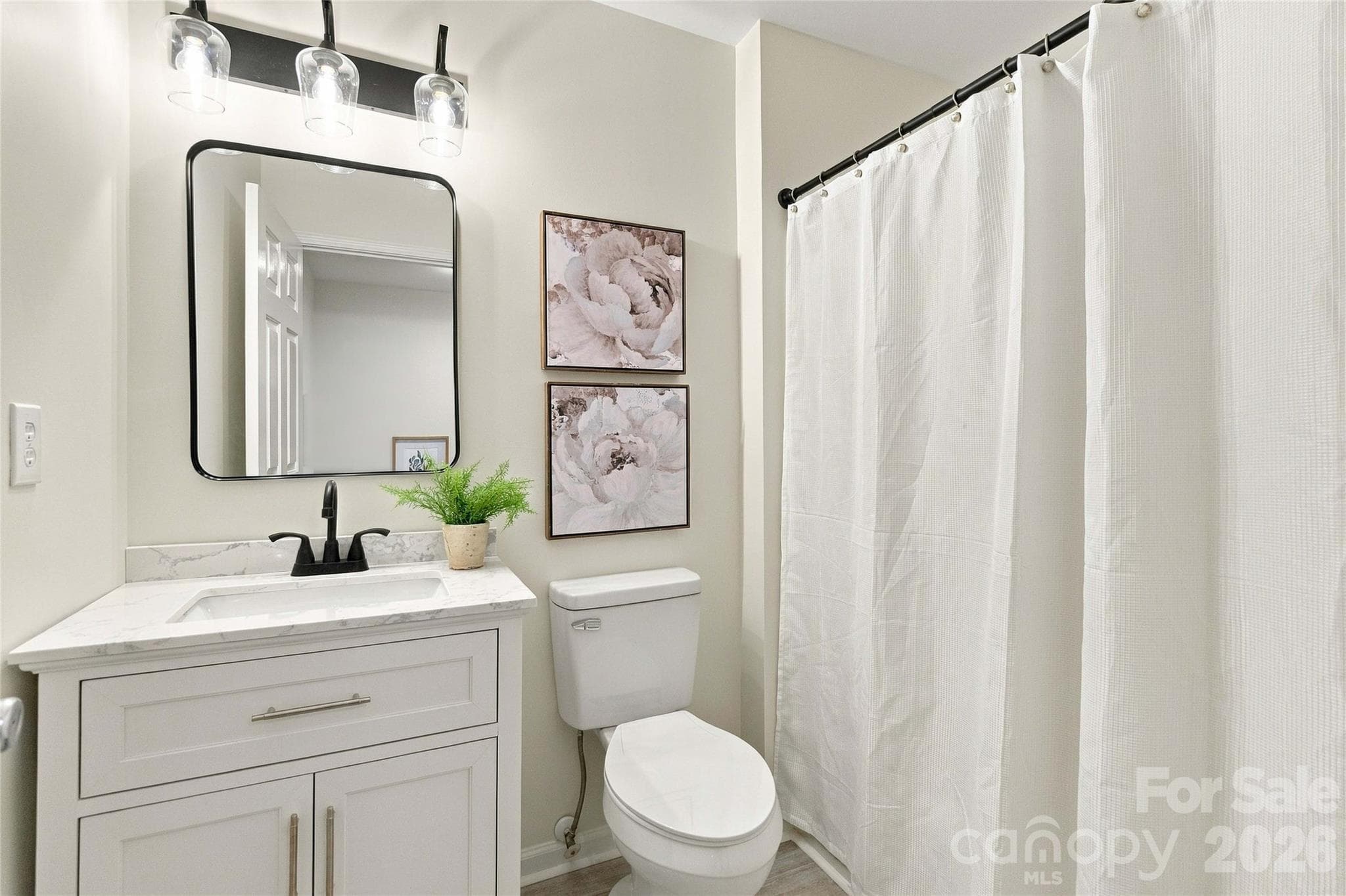 Full bathroom in hallways has all new vanity and fixtures too! - 18631 Oakhurst Boulevard, Cornelius