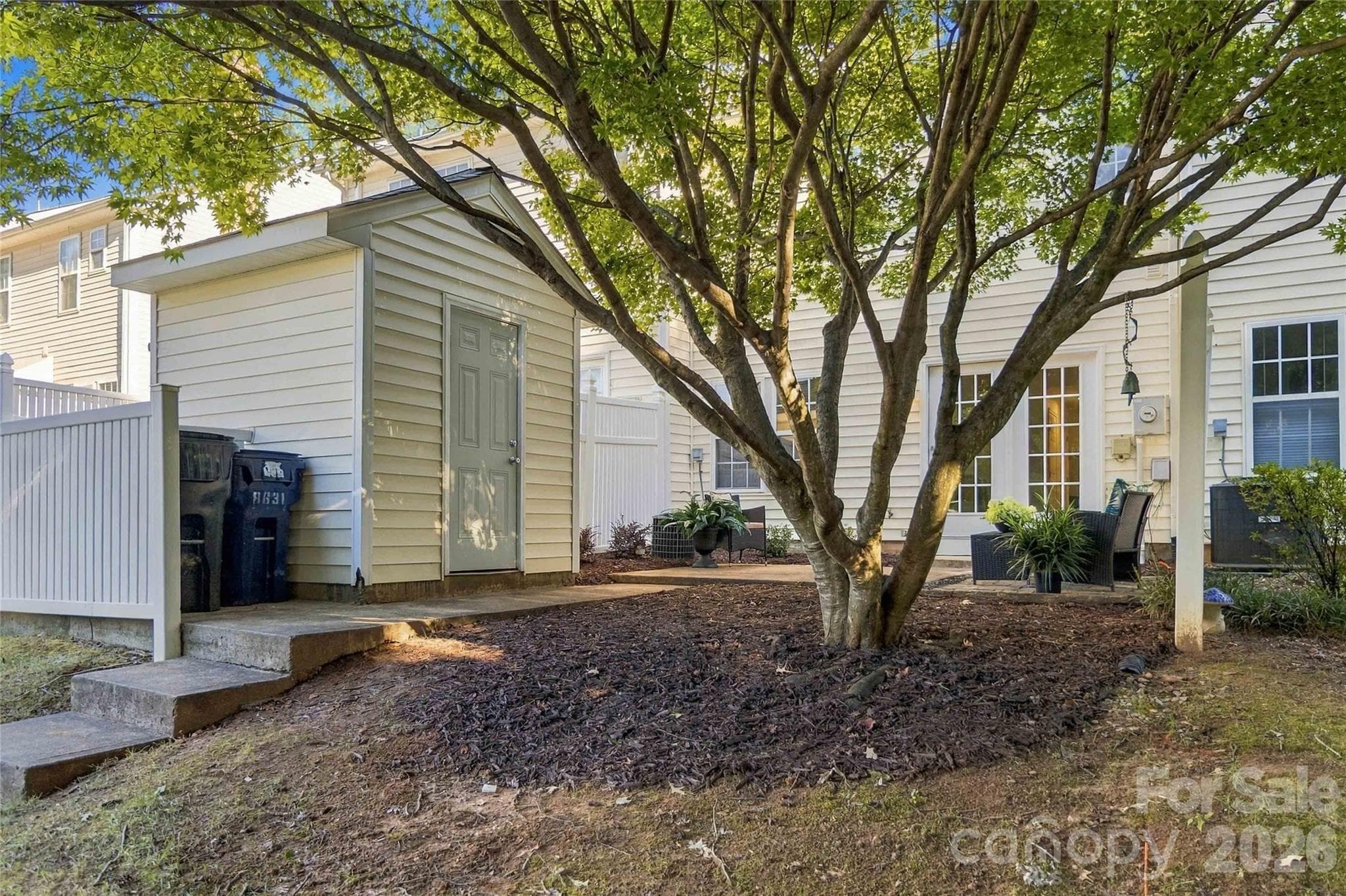 Storage and trash can enclosure in rear - 18631 Oakhurst Boulevard, Cornelius