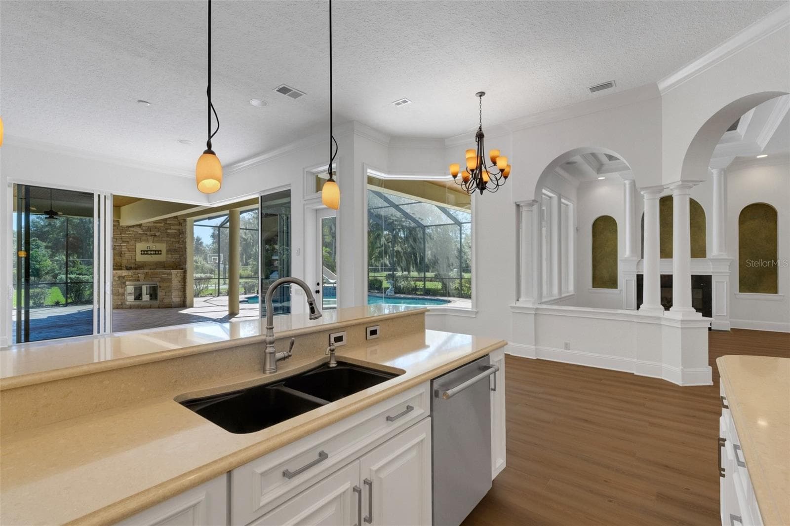 and being in the kitchen does not, by any means, take you away from the party. - 6562 EAGLE VIEW LOOP, LAKELAND