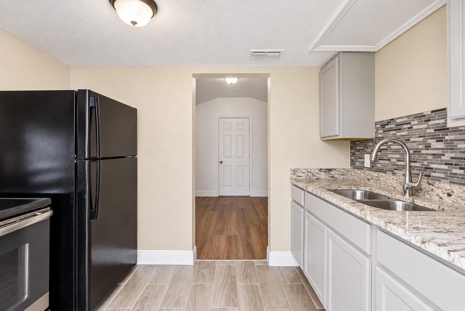 Virtually Staged Empty - 1307 W KALEY AVE, ORLANDO