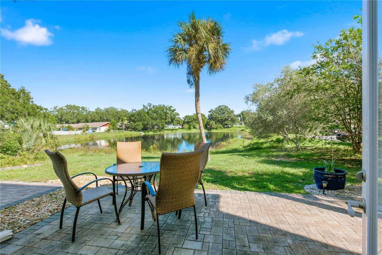 Oversized patio with pond views - 821 DELEON CT #109, DUNEDIN