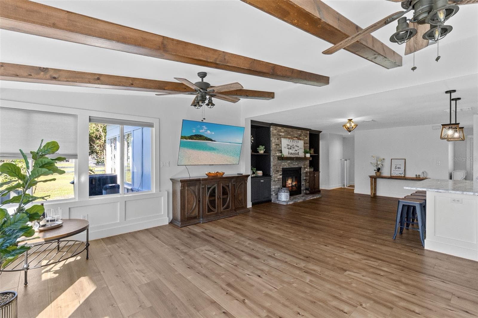 Notice the gorgeous beams and molding under the windows - 2670 MILLS CREEK RD, CHULUOTA