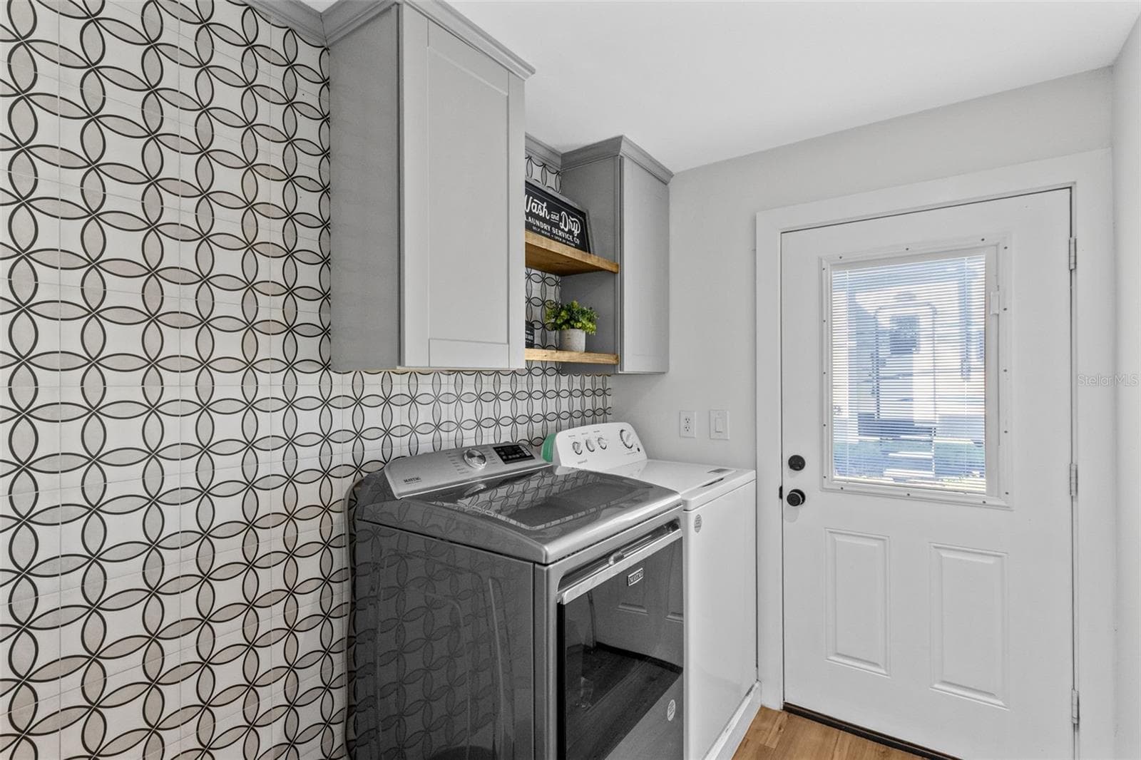 Check out this adorable laundry room. - 2670 MILLS CREEK RD, CHULUOTA