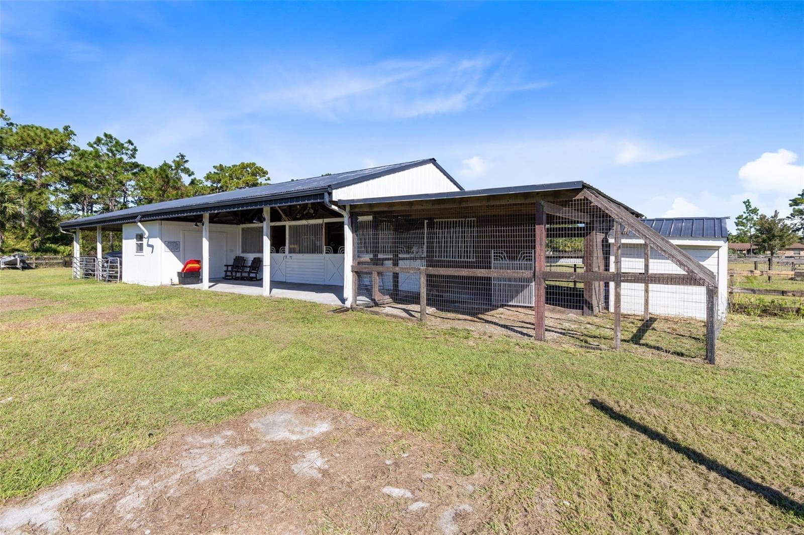 The 3 stall barn and chicken coop. - 2670 MILLS CREEK RD, CHULUOTA