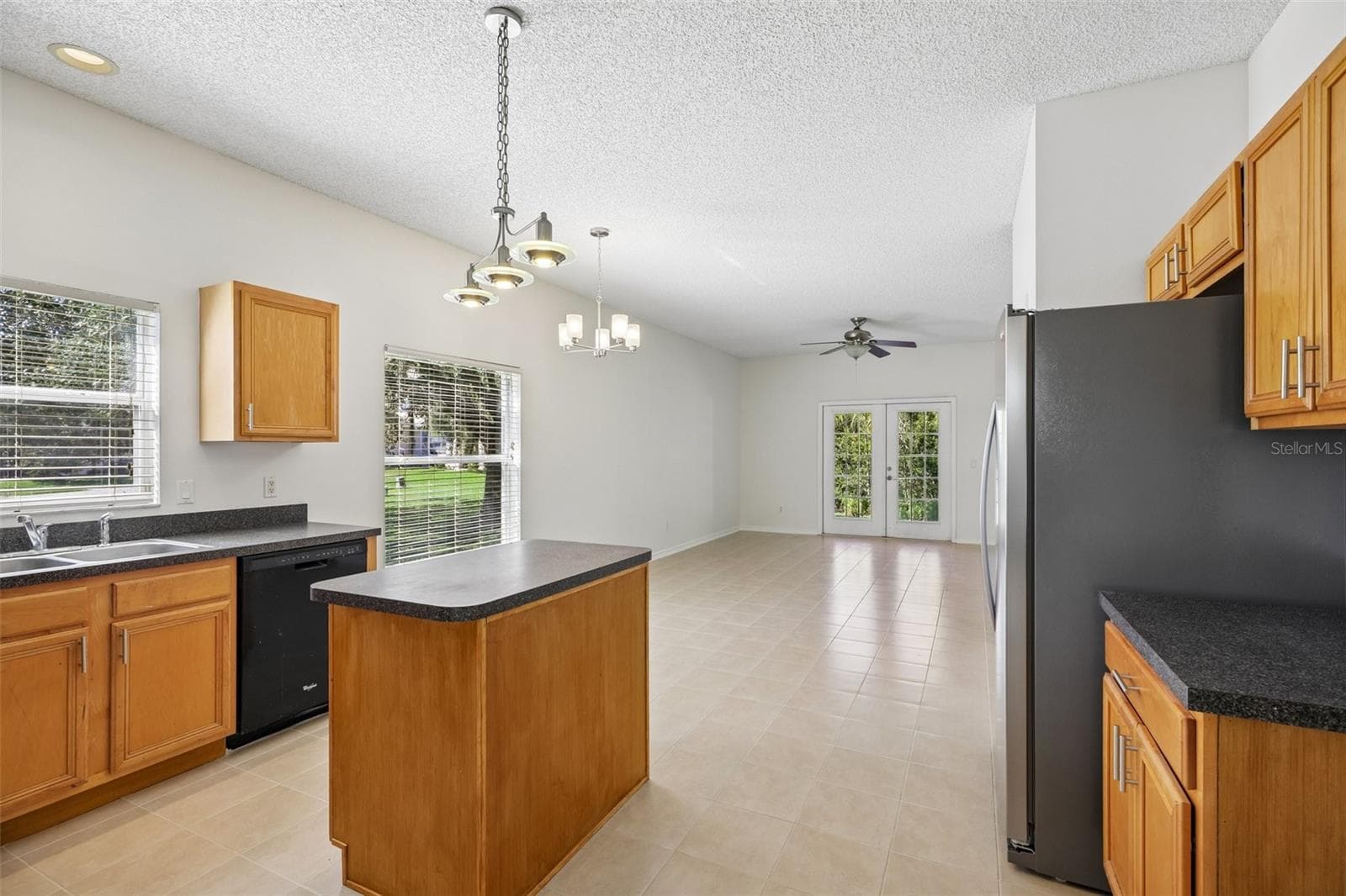The Kitchen flows naturally into the Family Room. - 1806 ANNA CATHERINE DR, ORLANDO
