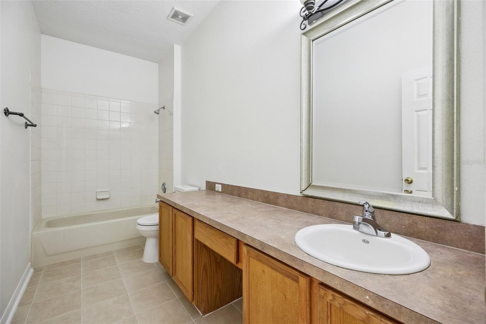 Two additional Bedrooms and a SECOND FULL BATH provide comfortable accommodations for family and guests. - 1806 ANNA CATHERINE DR, ORLANDO