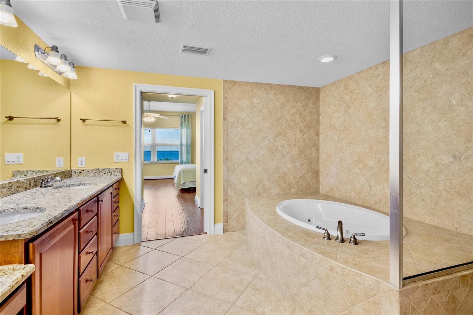 Primary bath with garden tub and walk-in shower. - 2825 TERRA CEIA BAY BLVD #1402, PALMETTO
