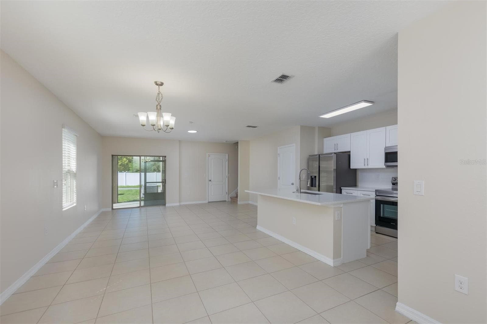Open-concept living space - 1485 RYLEE ROCK WAY, KISSIMMEE