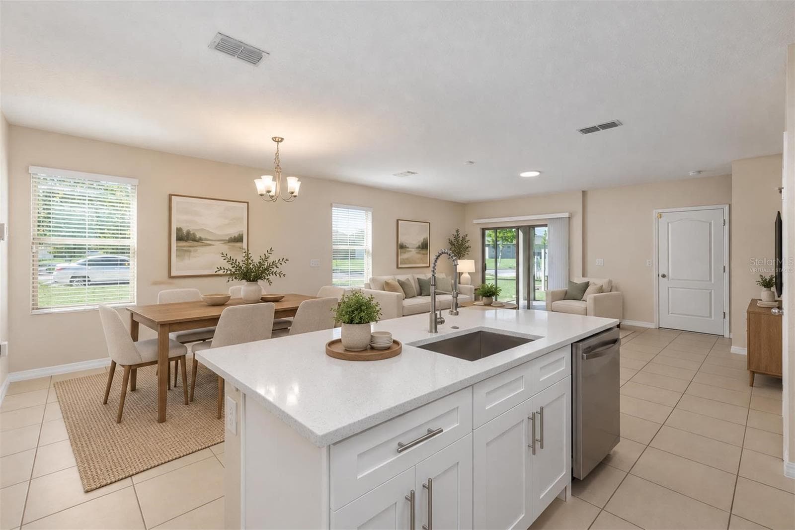 Virtually Staged - Living and kitchen connection - 1485 RYLEE ROCK WAY, KISSIMMEE
