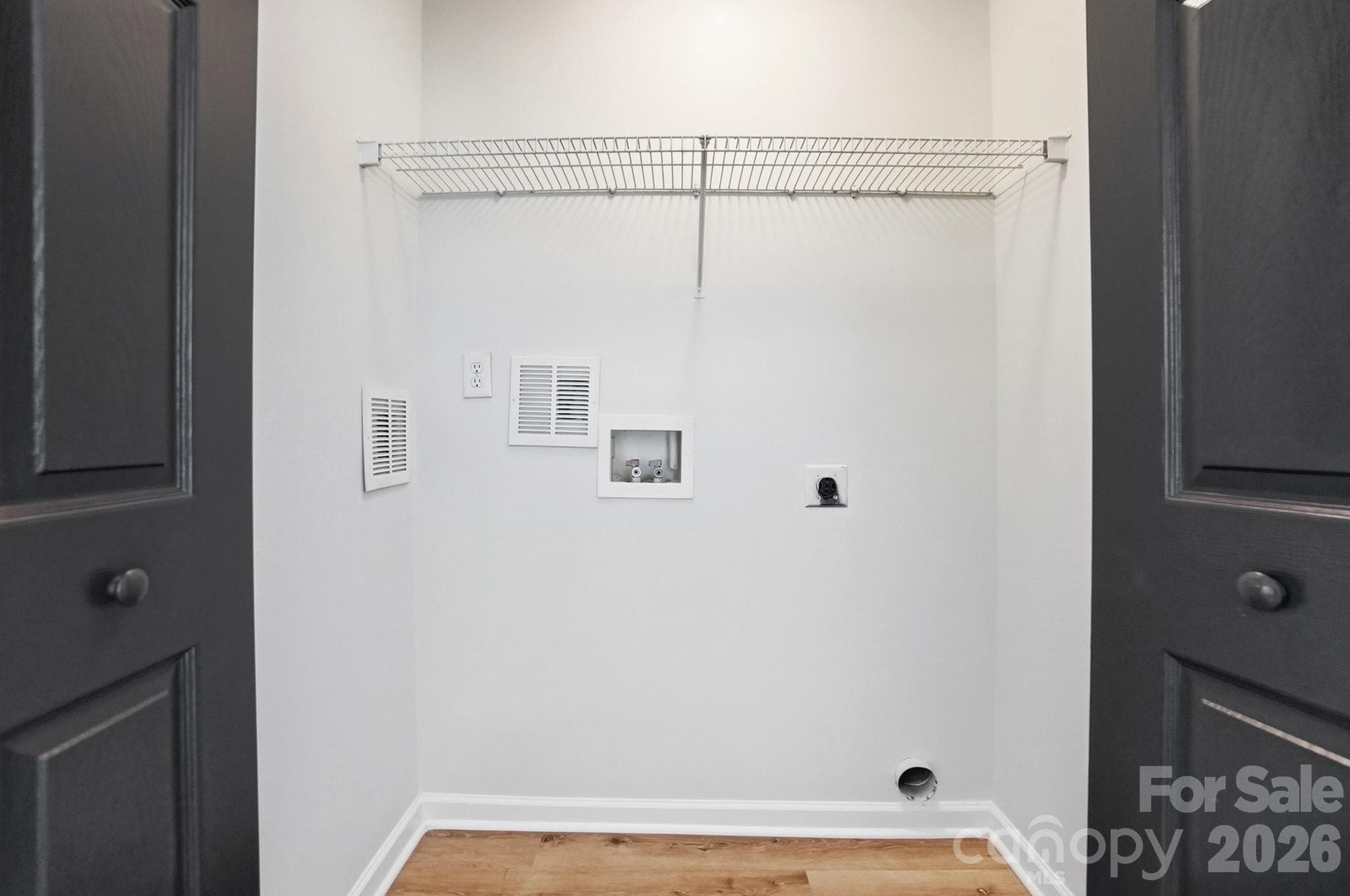 Laundry closet - Main Level - 10584 English Setter Way, Charlotte