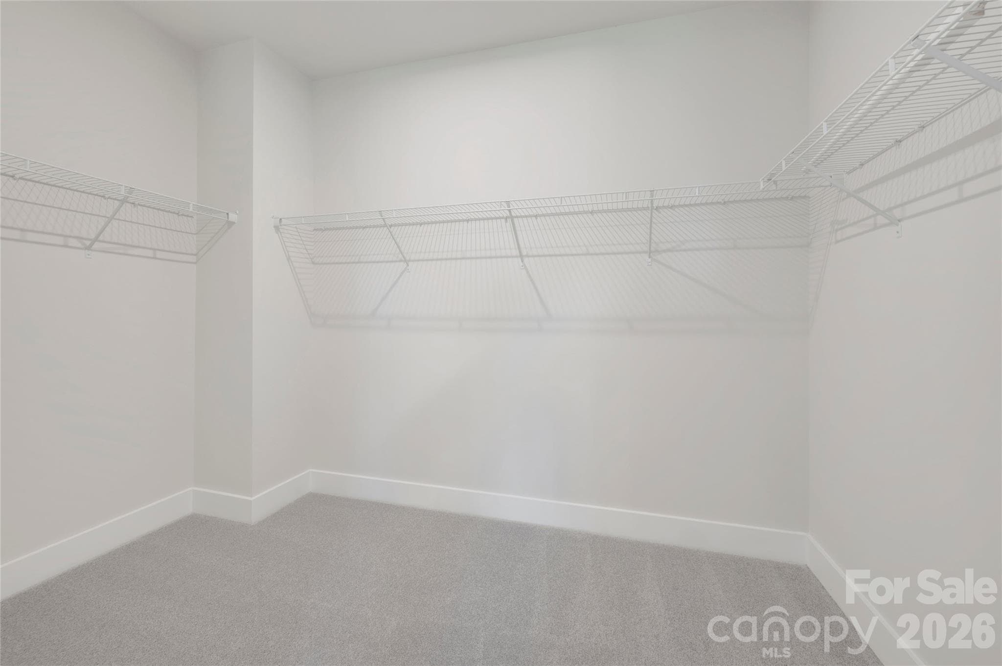 Primary walk-in closet - 75 Seven Oaks Landing, Belmont