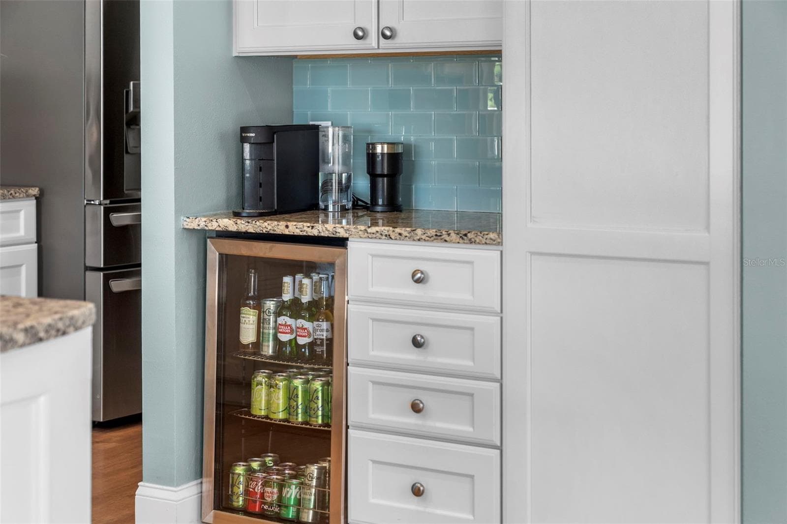 Generous storage, and a dedicated beverage station keep everyday essentials close at hand. - 4739 COMPASS DR, BRADENTON