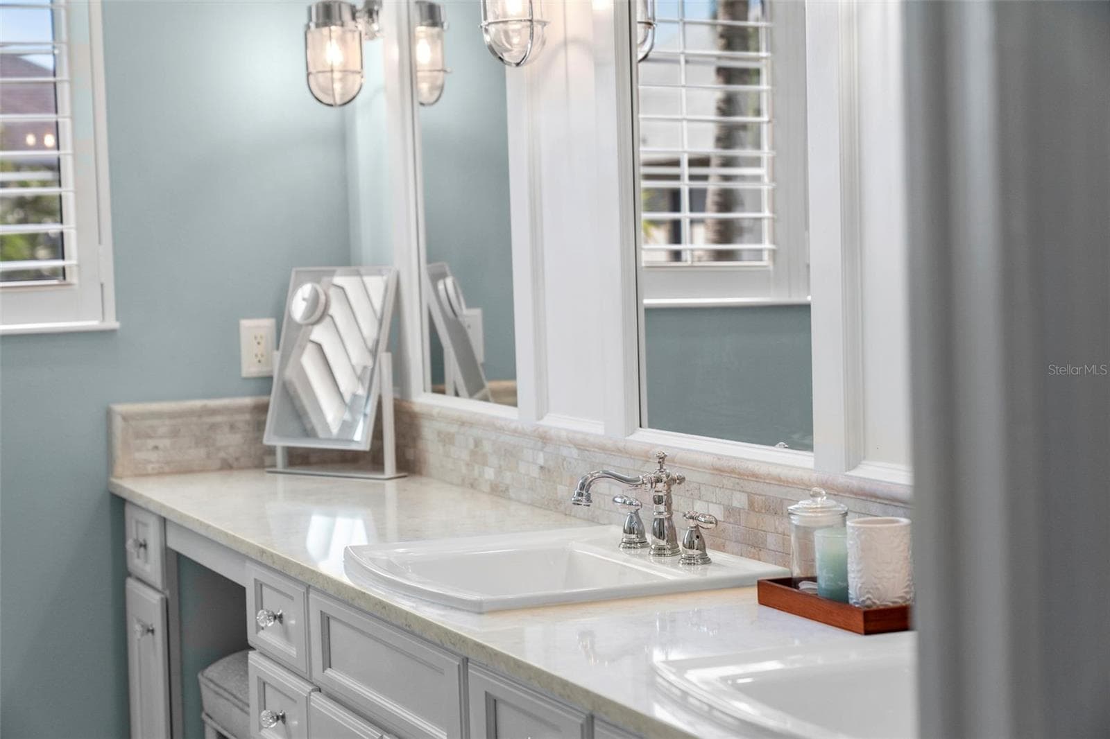 Elegant finishes and a dedicated seated vanity bring thoughtful comfort to your morning routine. - 4739 COMPASS DR, BRADENTON