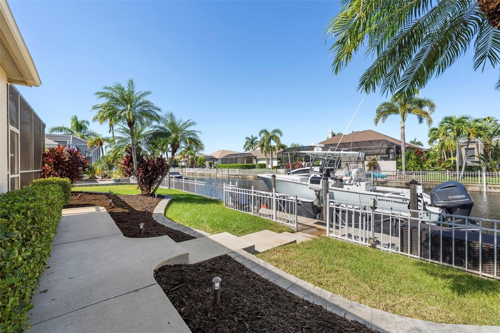 Keep your boating plans close to home with a private dock just steps from the backyard. - 4739 COMPASS DR, BRADENTON