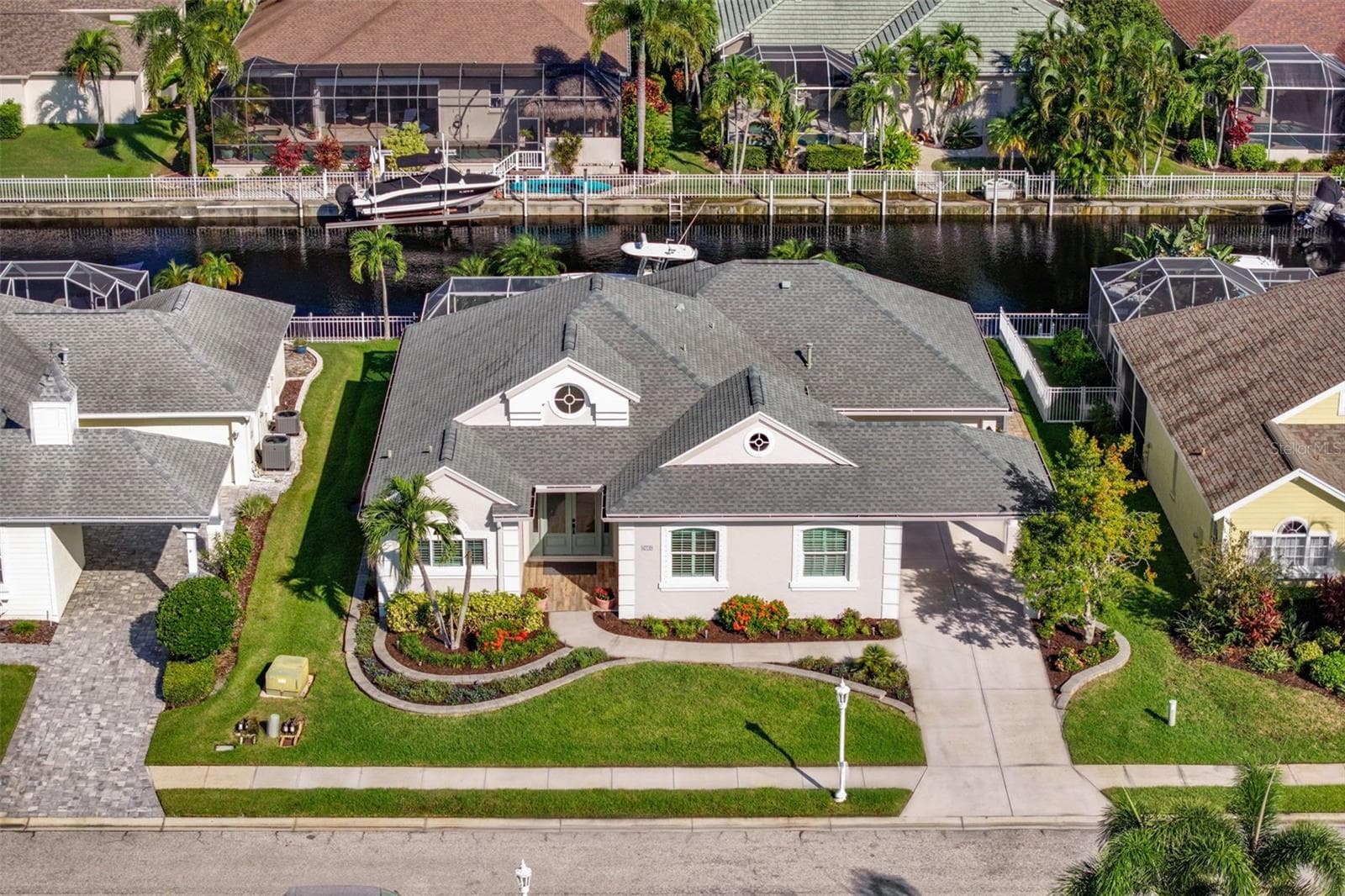 Discover a neighborhood shaped by waterways, tropical landscaping, and the pleasures of Florida boating life. - 4739 COMPASS DR, BRADENTON