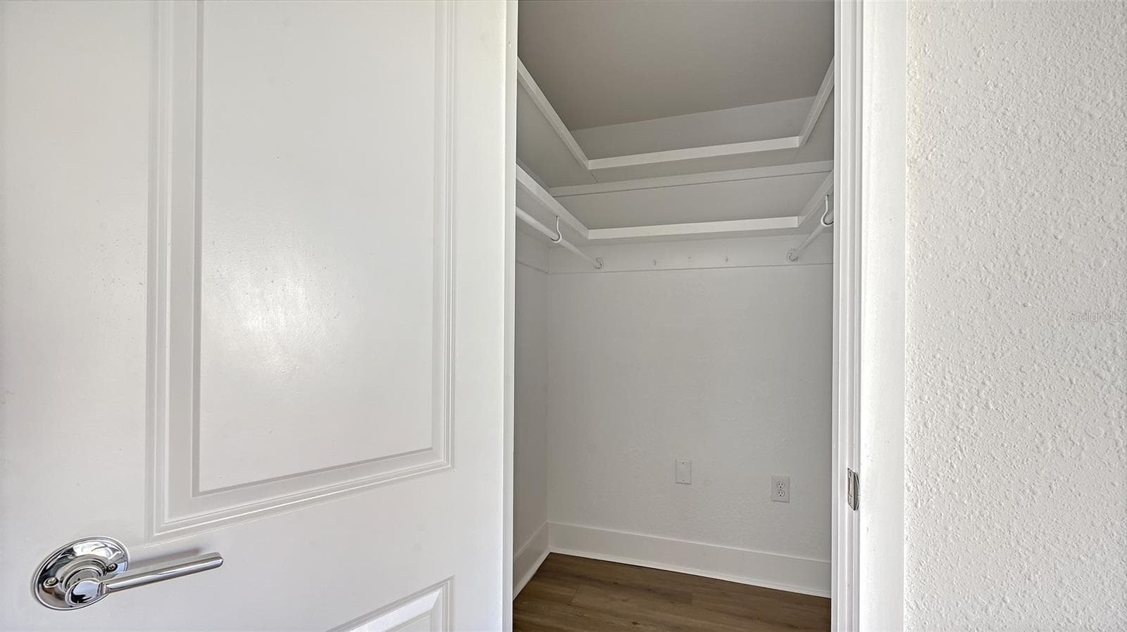 Primary Bedroom (bedroom one) walk-in closet. - 693 SPANISH DR N #24, LONGBOAT KEY