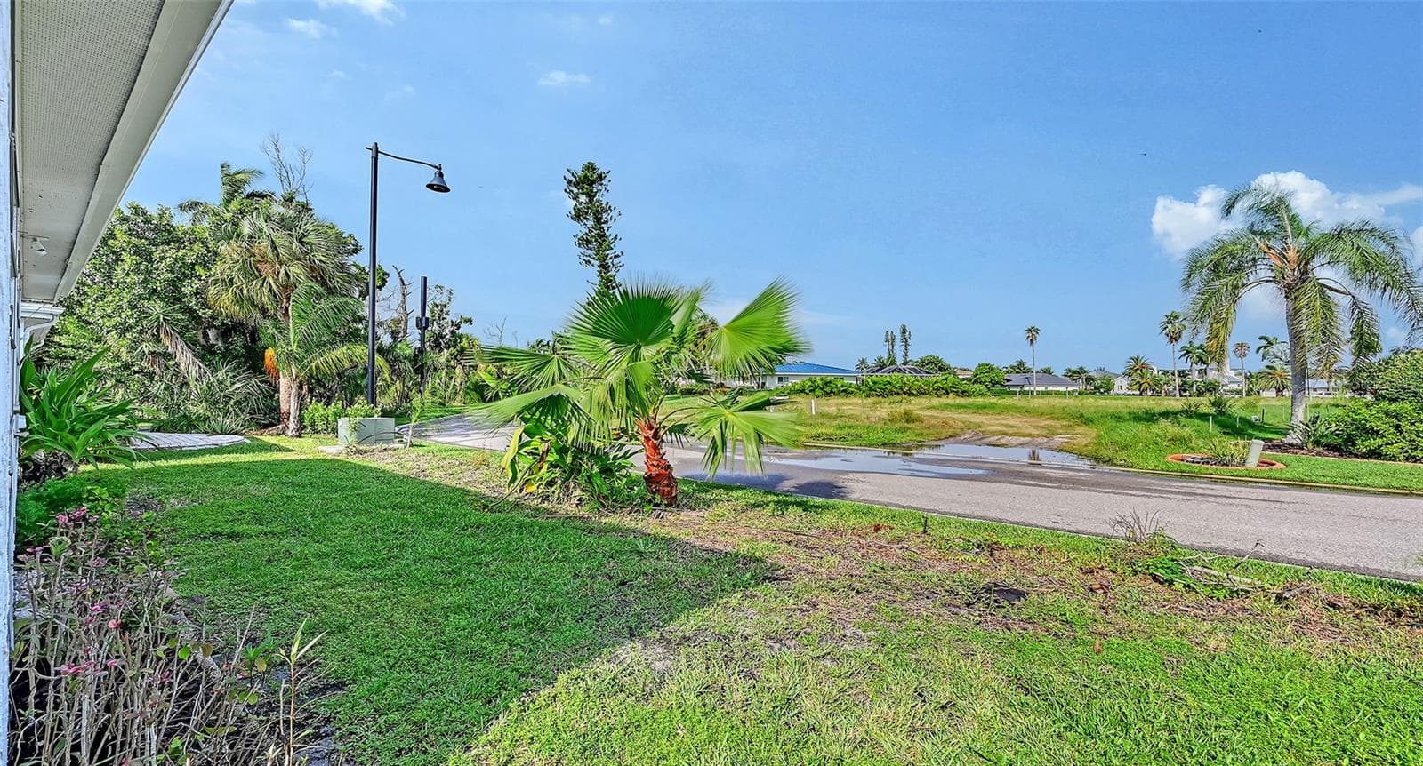 Greenbelt view from the rear of the villa and the lanai. - 693 SPANISH DR N #24, LONGBOAT KEY