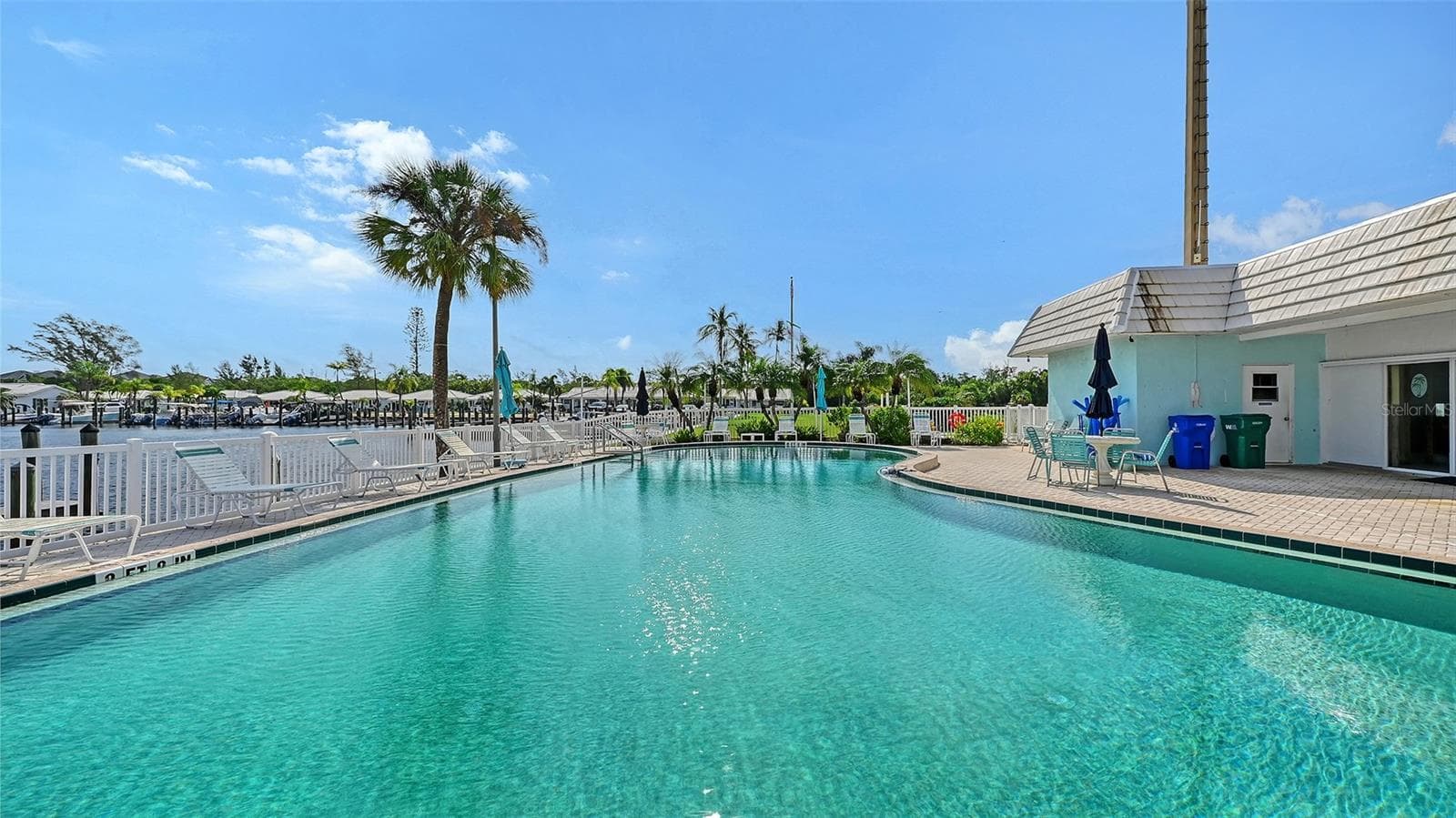 Association swimming pool behind the clubhouse. - 693 SPANISH DR N #24, LONGBOAT KEY
