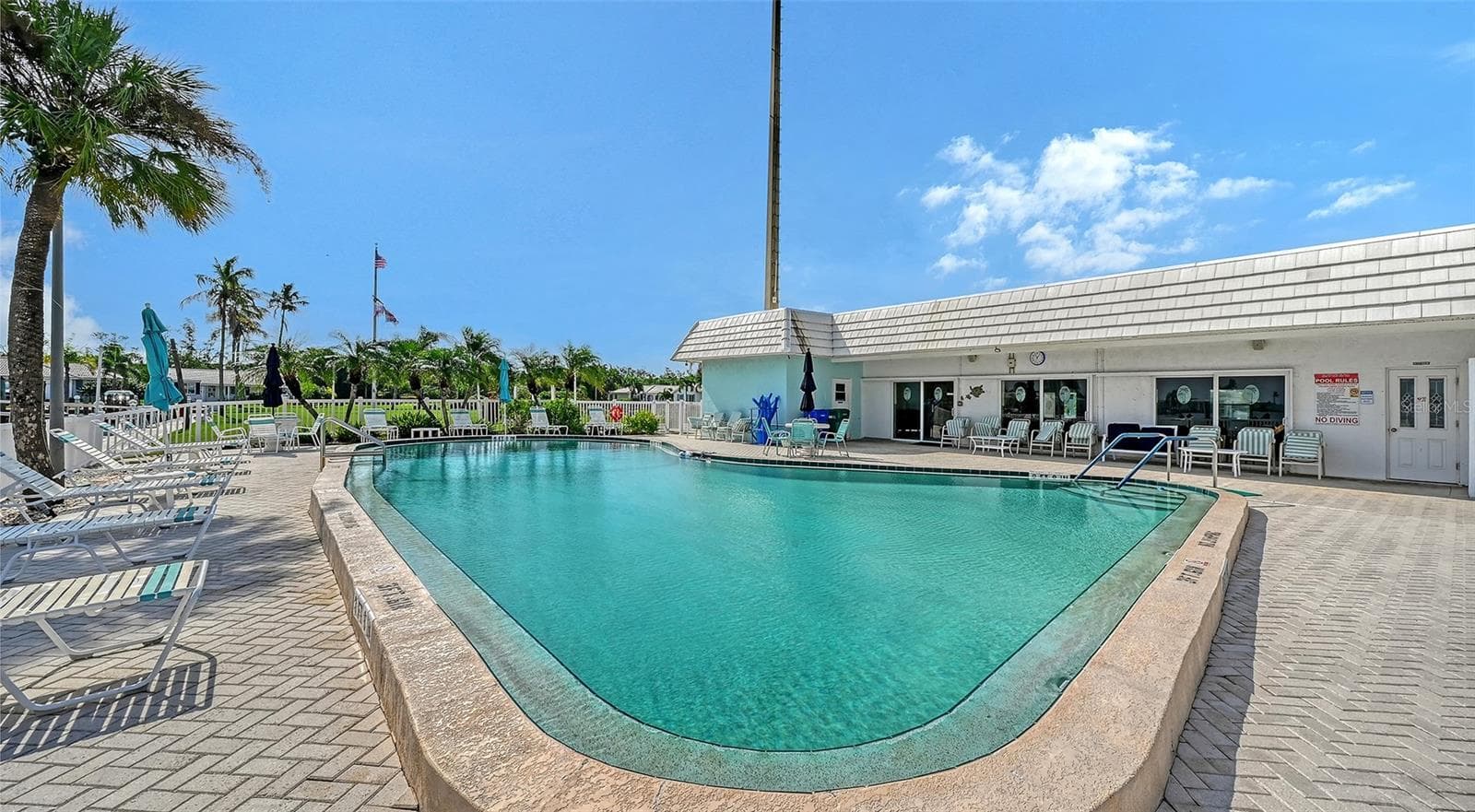Association swimming pool behind the clubhouse. - 693 SPANISH DR N #24, LONGBOAT KEY