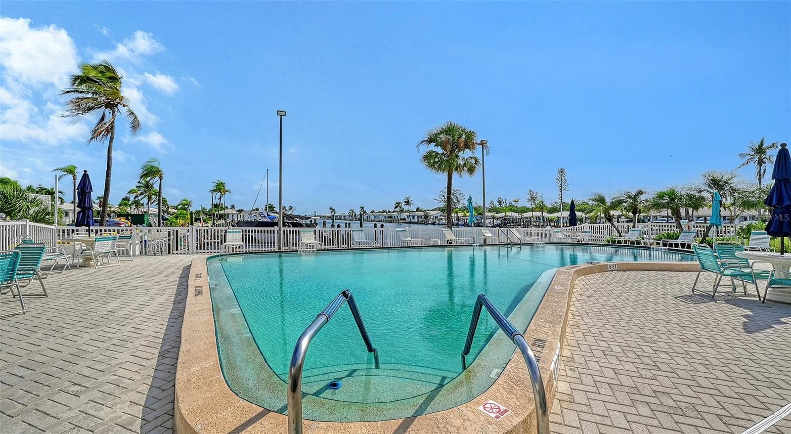 Association swimming pool behind the clubhouse. - 693 SPANISH DR N #24, LONGBOAT KEY
