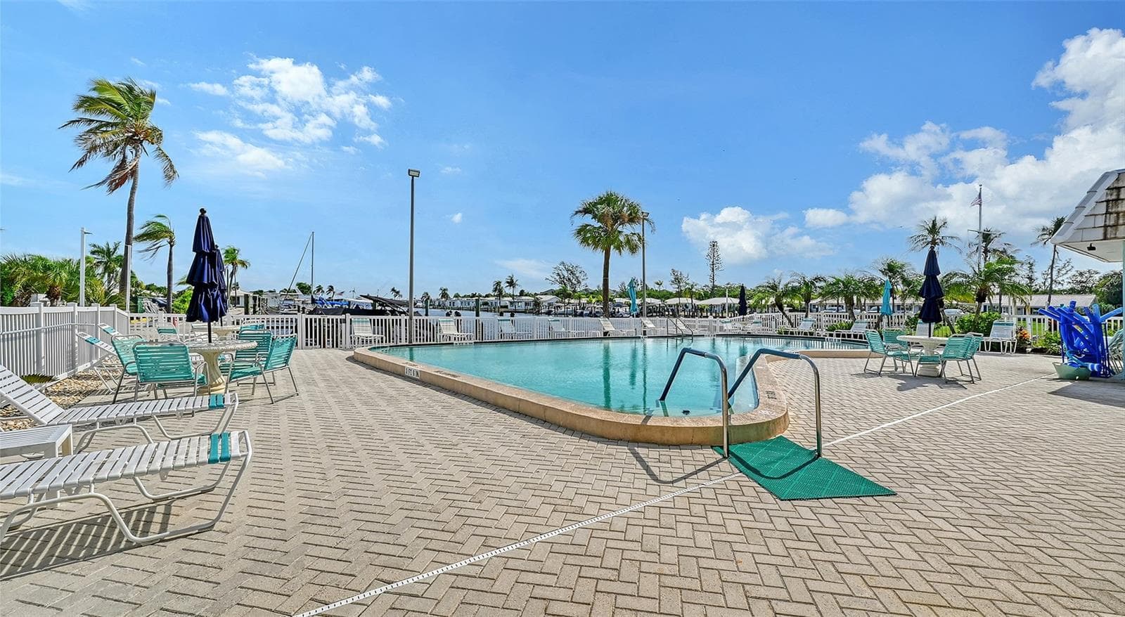 Association swimming pool behind the clubhouse. - 693 SPANISH DR N #24, LONGBOAT KEY