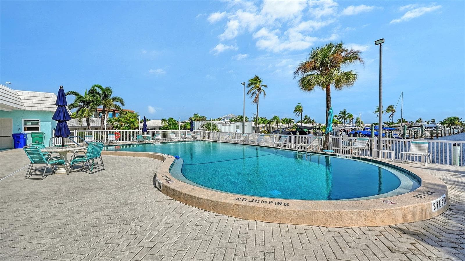 Association swimming pool behind the clubhouse. - 693 SPANISH DR N #24, LONGBOAT KEY