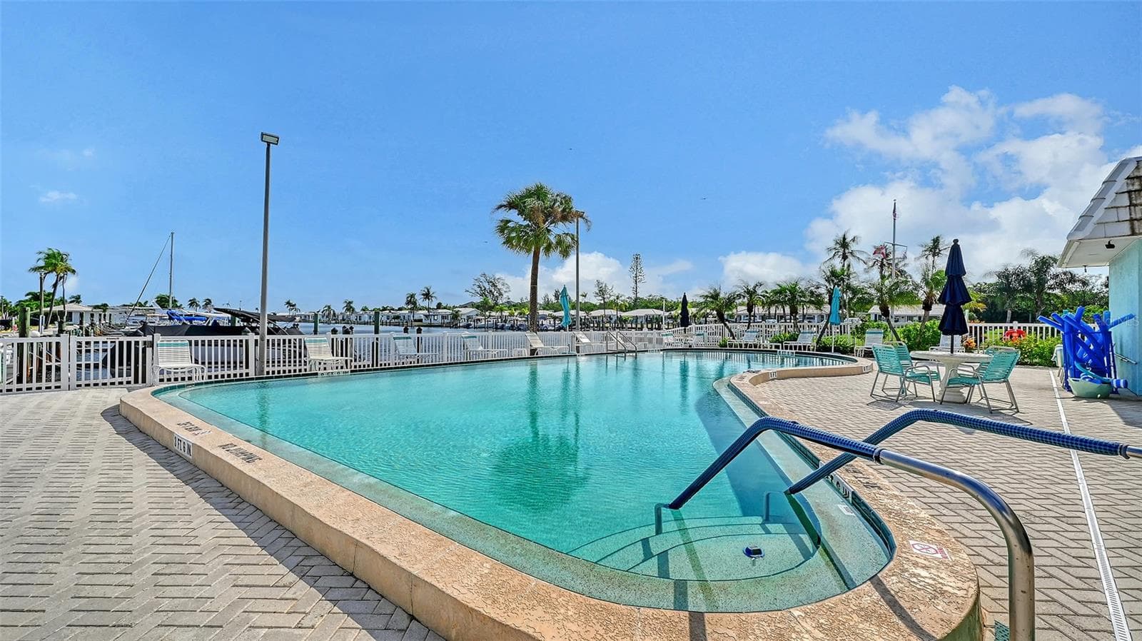 Association swimming pool behind the clubhouse. - 693 SPANISH DR N #24, LONGBOAT KEY