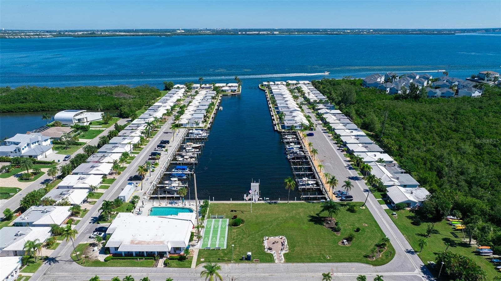 Spanish Main Clubhouse, shuffleboard, Relaxation Garden, Fishing Pier, and canoe/kayak launch. - 693 SPANISH DR N #24, LONGBOAT KEY