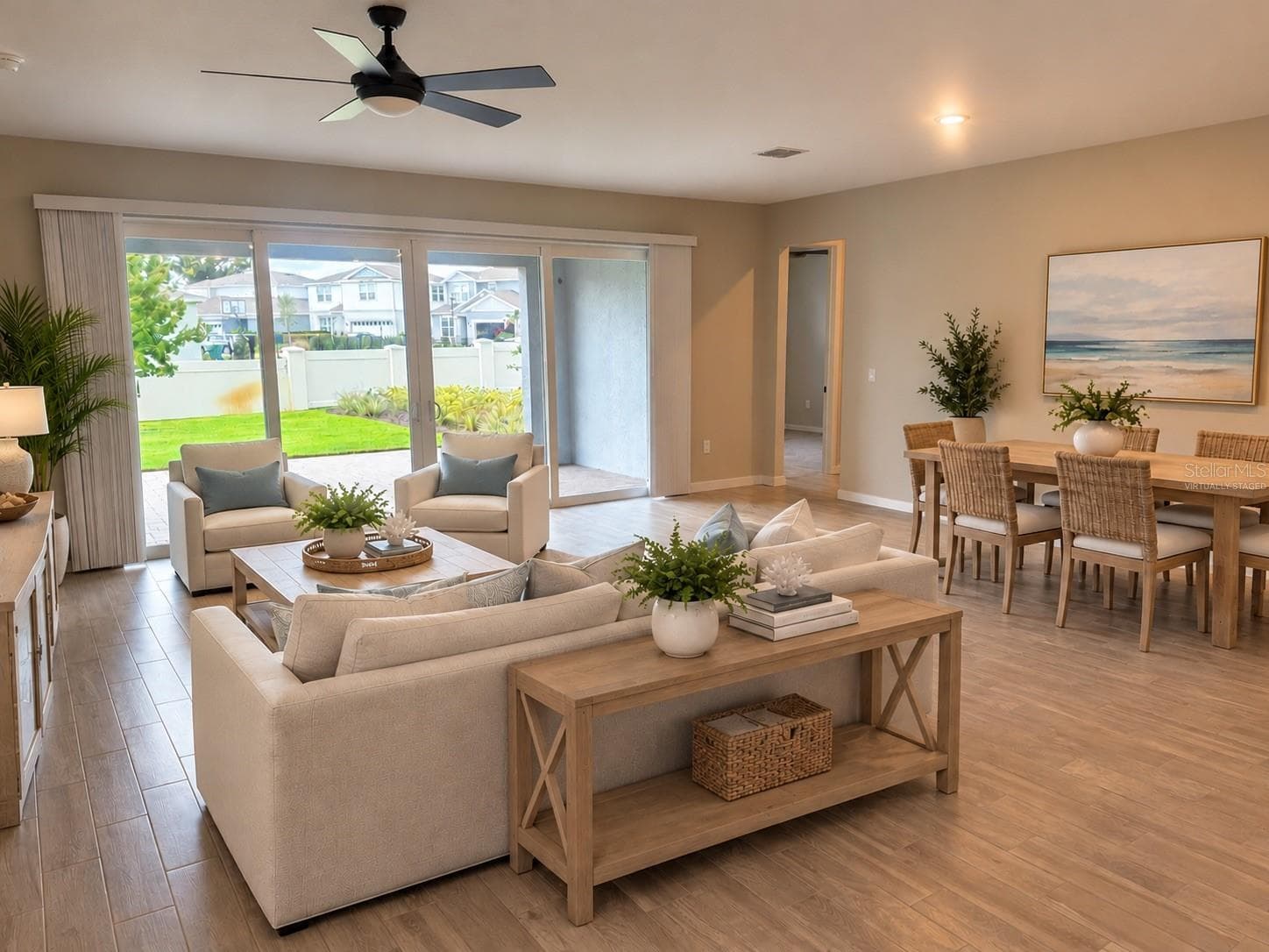 virtually staged - Family room and dining - 15363 WILLOW RIDGE DR, MONTVERDE