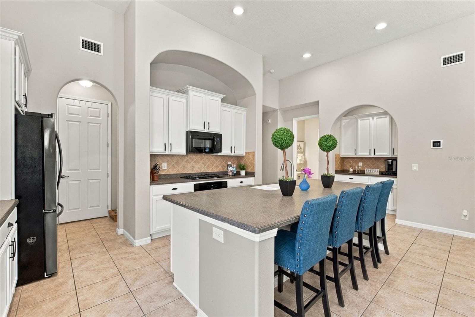 Kitchen-Expansive Island With Seating/Stainless Steel Appliances - 20316 HERITAGE POINT DR, TAMPA