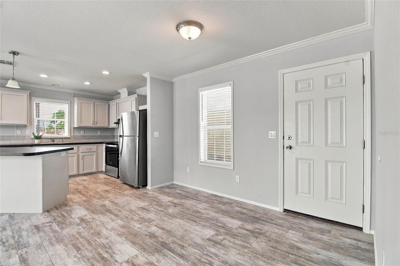 Entrance into Open Concept Kitchen, LR & DR - 18675 U.S. HIGHWAY 19 N. #349, CLEARWATER