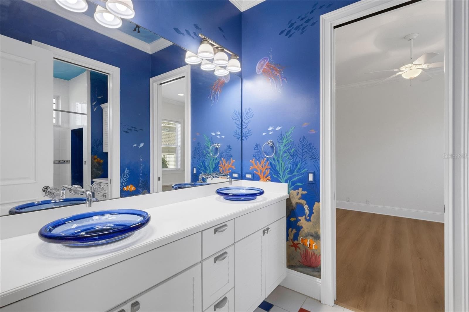 Bathroom# 2 has a custom painted mural that will make children WANT to take a bath. - 6562 EAGLE VIEW LOOP, LAKELAND