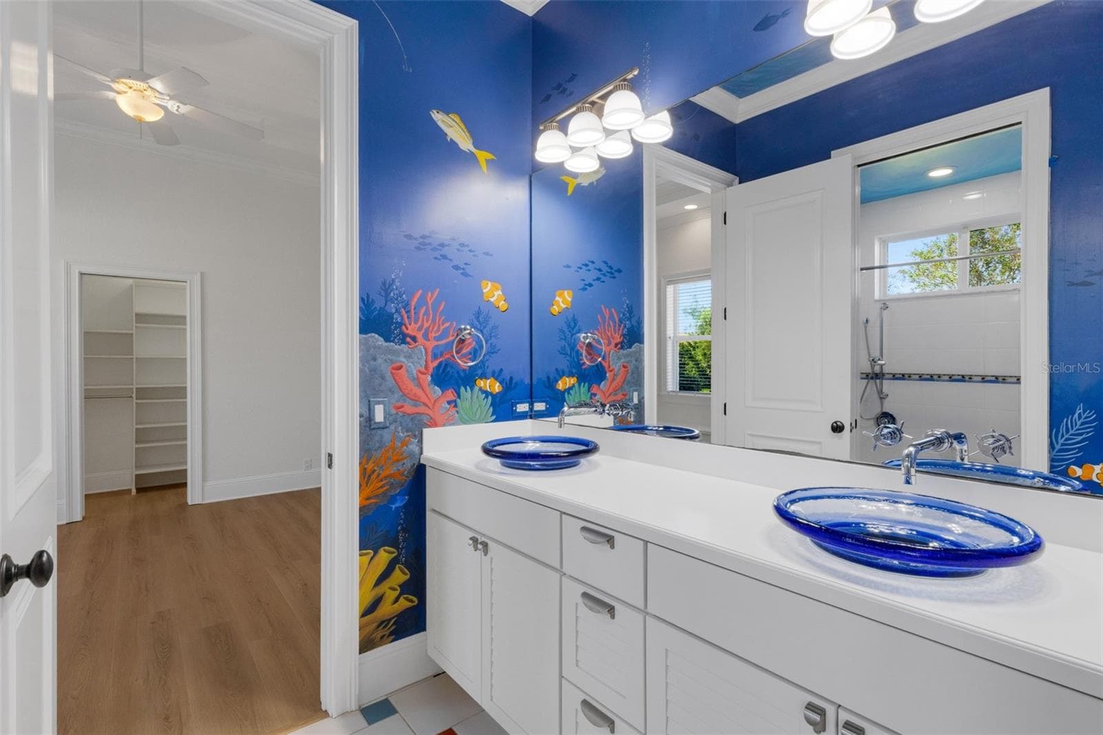 and the glass countertop mounted sinks will make brushing their teeth a treat! - 6562 EAGLE VIEW LOOP, LAKELAND
