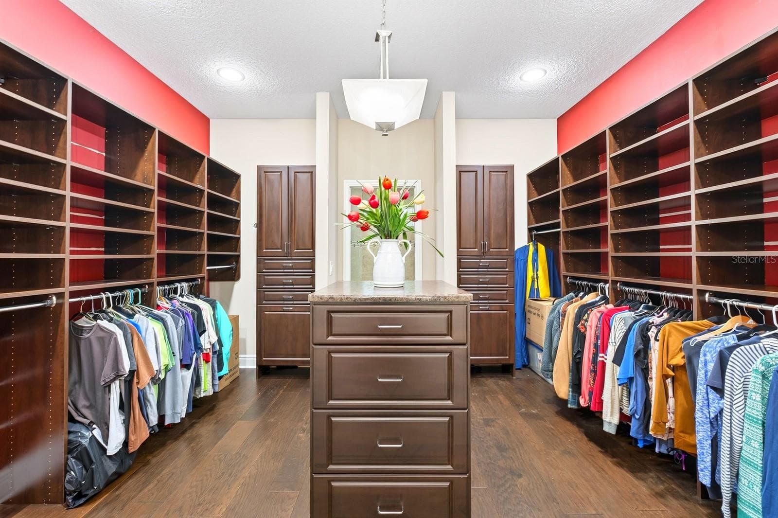 13x13 dual sided walk-in closet with custom storage. - 4443 PINE GOLD AVE, APOPKA