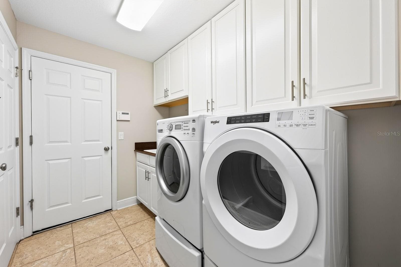 Large laundry Room. - 4443 PINE GOLD AVE, APOPKA