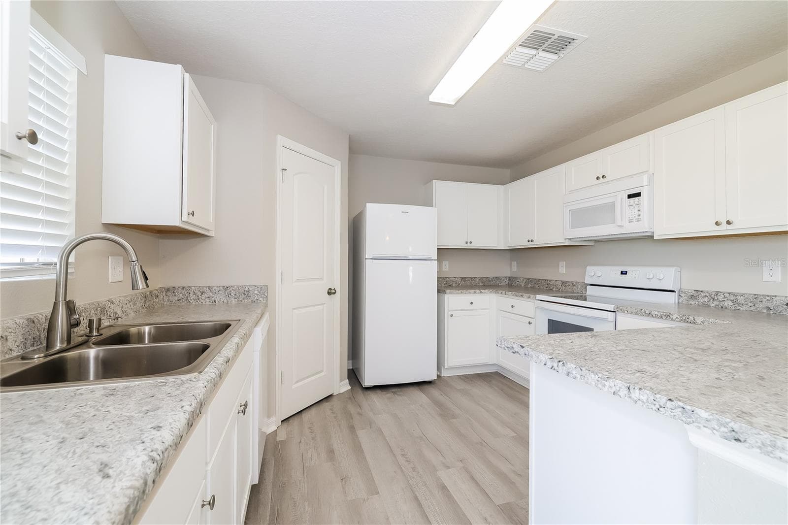 Single Family Residence at 2137 ROCK DR, POINCIANA, photo 5 of 15