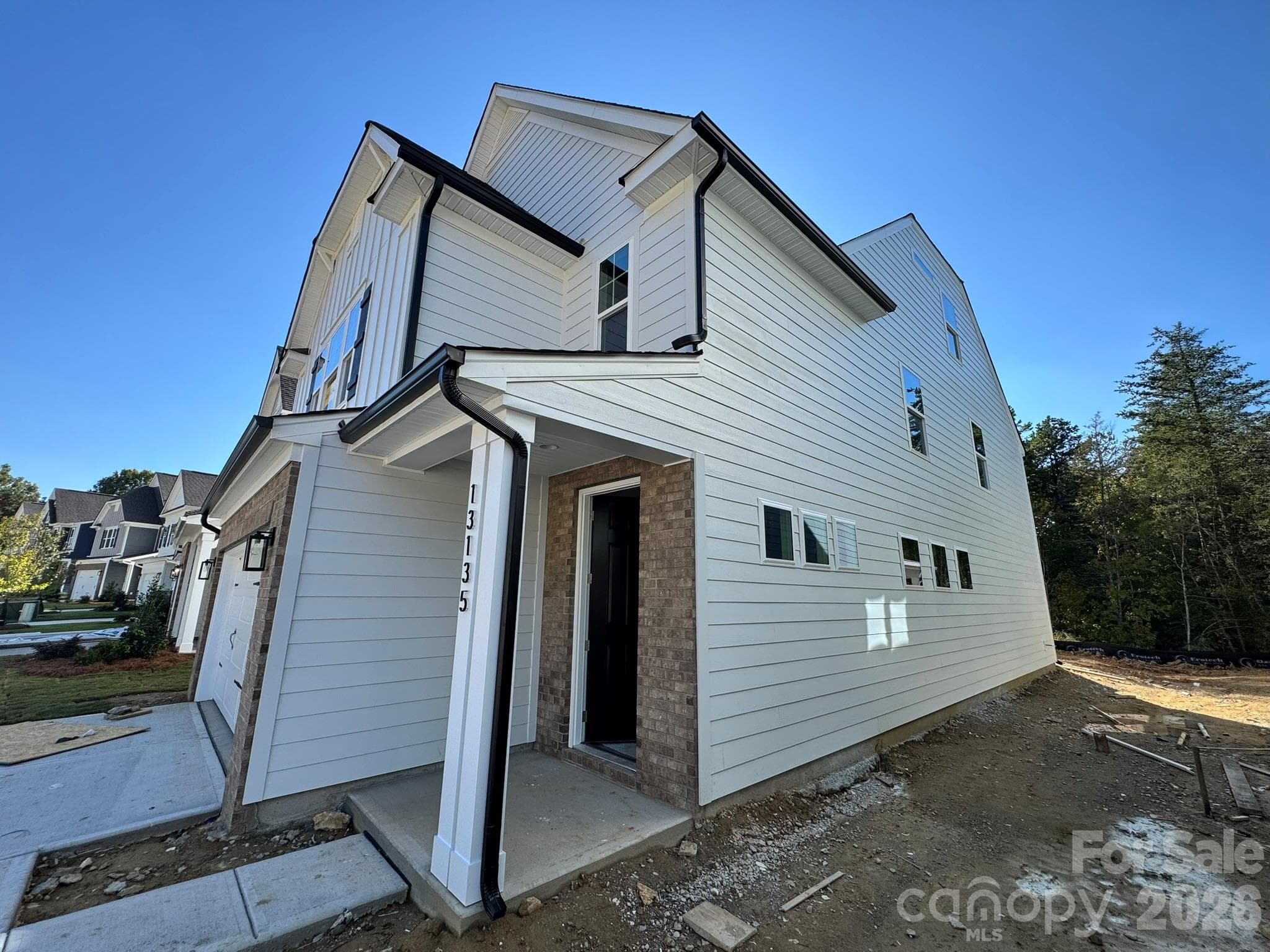 Homesite 32 features a Dillon B floorplan - 13135 Foxberry Road, Charlotte