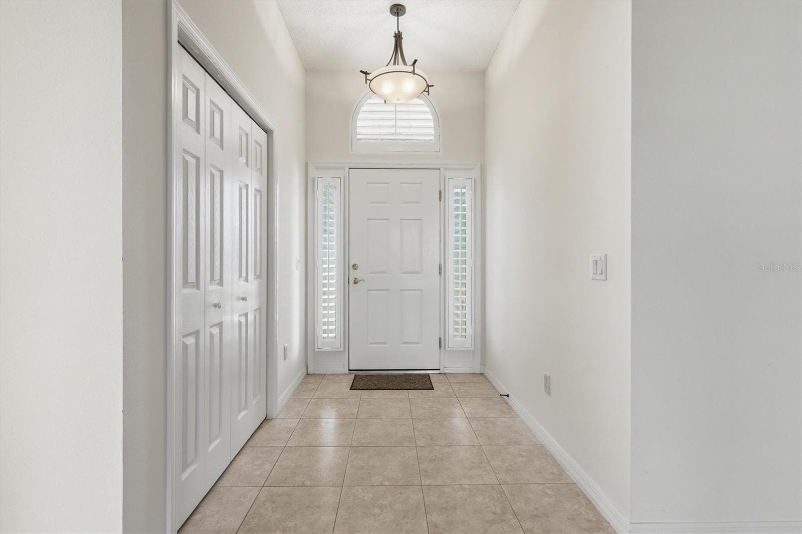 Foyer and Front Door with Coat Closet. - 1563 EASTOVER TER, THE VILLAGES